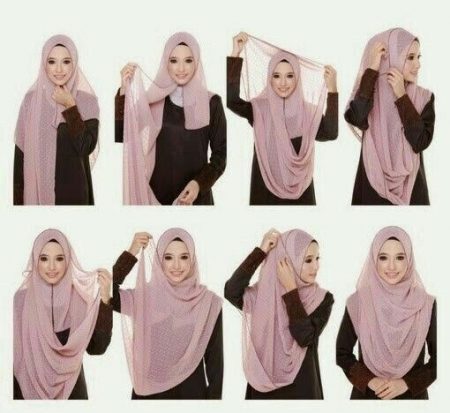 Wanita menggayakan shawl dengan gaya cantik dan kemas.