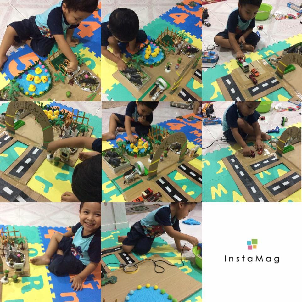 Haiwan mainan diletakkan di atas rumput untuk mewujudkan mini zoo