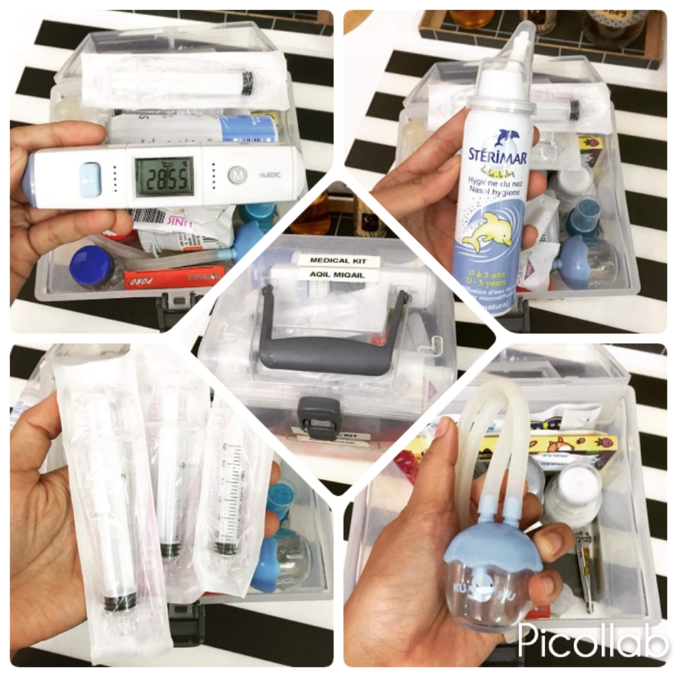 Pelbagai botol ubat, alatan perubatan dan kelengkapan medical kit anak tersusun rapi di dalam bekas.