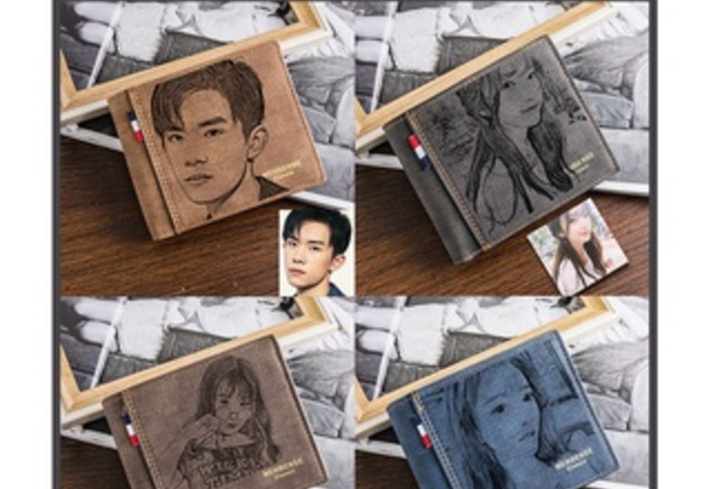 Dompet kulit lelaki berwarna gelap